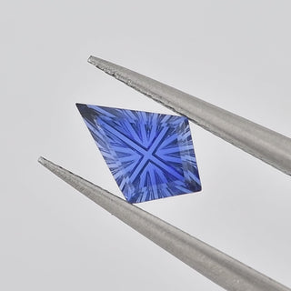 Lab-Grown Blue Sapphire kite 6 x 9 mm Faelight Cut video, turning to show the starburst flashes