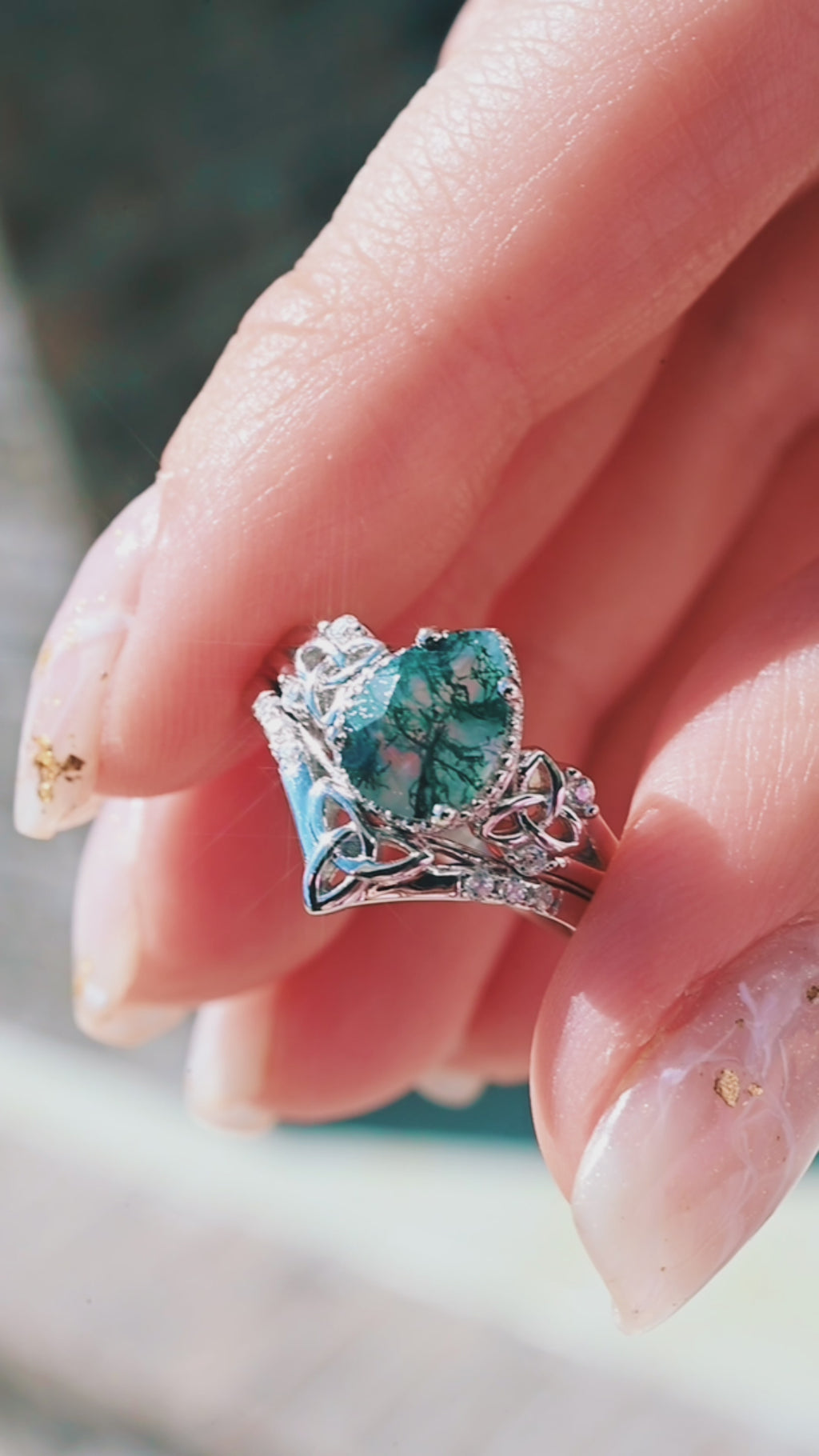 Video of the Celtic knot moss agate ring by Aquamarise, shown in motion