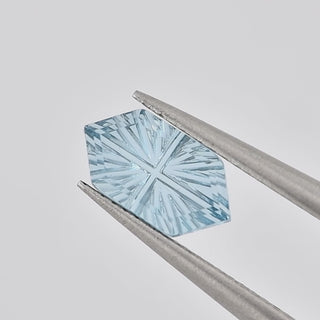 Natural Sky Blue Topaz long hexagon 5 x 9 mm Faelight Cut video, turning to show the starburst flashes