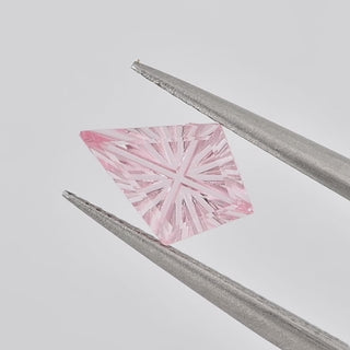 Lab-Grown Pink Sapphire kite 7 x 10 mm Faelight Cut video, turning to show the starburst flashes