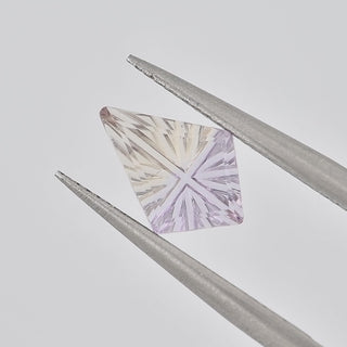 Natural Ametrine kite 7 x 10 mm Faelight Cut video, turning to show the starburst flashes