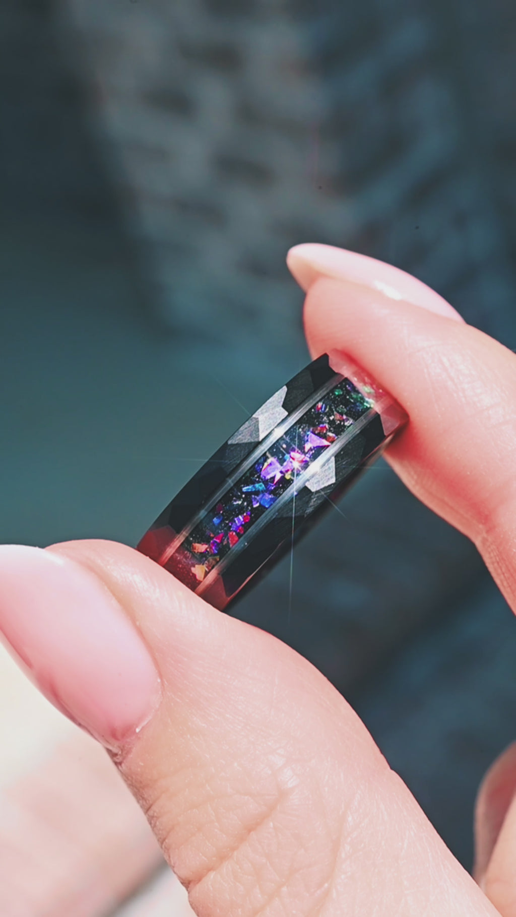 Video of the Mystic Topaz & Galaxy Opal Men's Wedding Band in Tungsten Carbide by Aquamarise, shown in motion