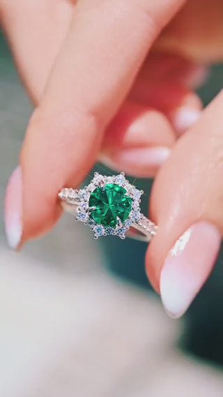 Hand holding Emerald Engagement Ring Round Emerald Halo Ring
