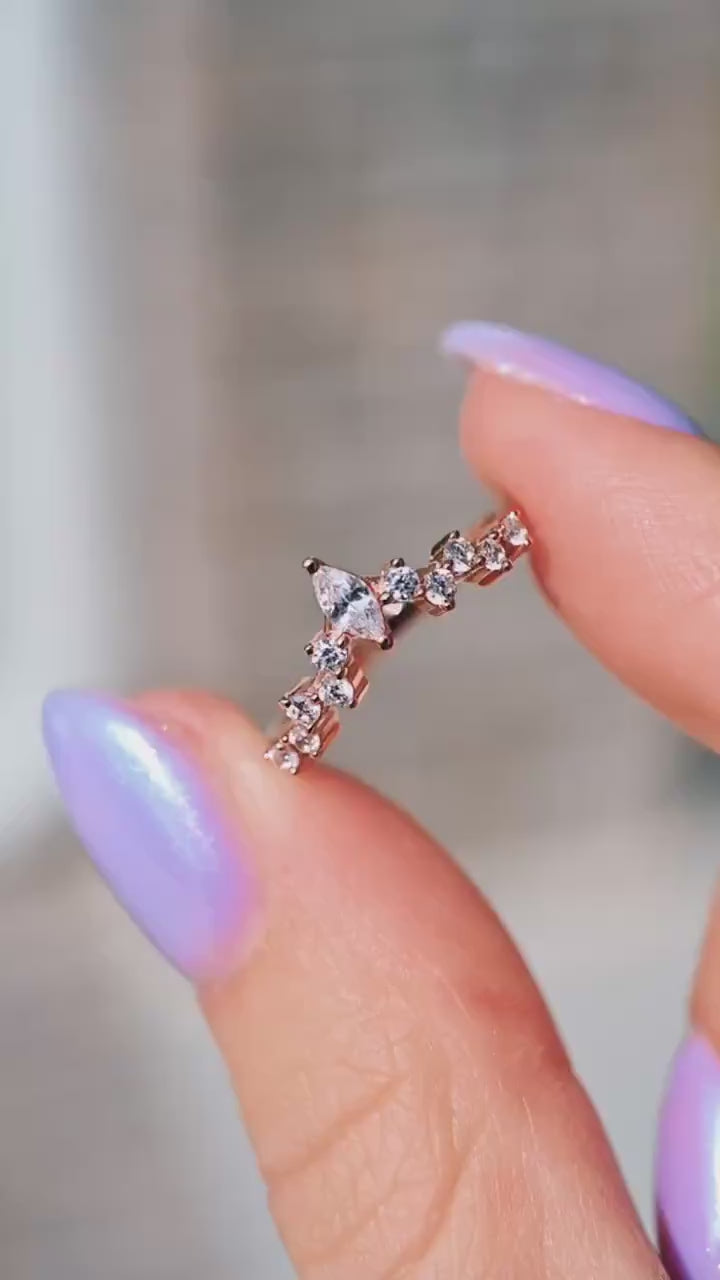 Video of the Chevron Curved Wedding Band in 14K Rose Gold Vermeil by Aquamarise, shown in motion