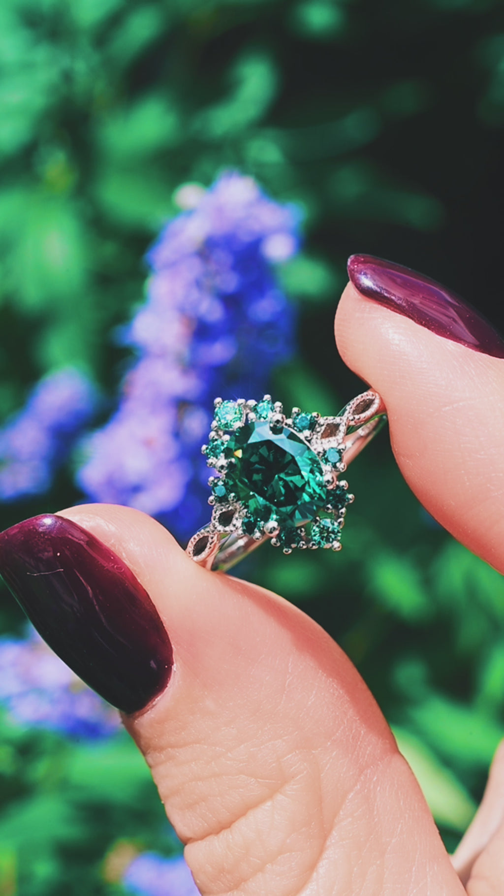 Video of a teal moissanite engagement ring by Aquamarise, shown sparkling in motion