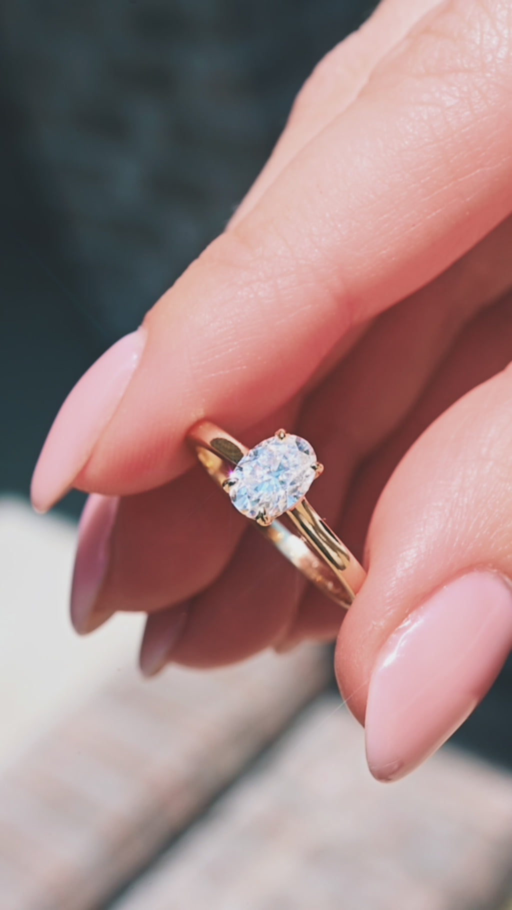 Video of a 1 carat solitaire engagement ring by Aquamarise, shown sparkling in motion