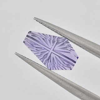 Lab-Grown Lavender Purple Sapphire coffin 6 x 10 mm Faelight Cut video, turning to show the starburst flashes