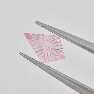 Lab-Grown Pink Sapphire kite 6 x 9 mm Faelight Cut video, turning to show the starburst flashes