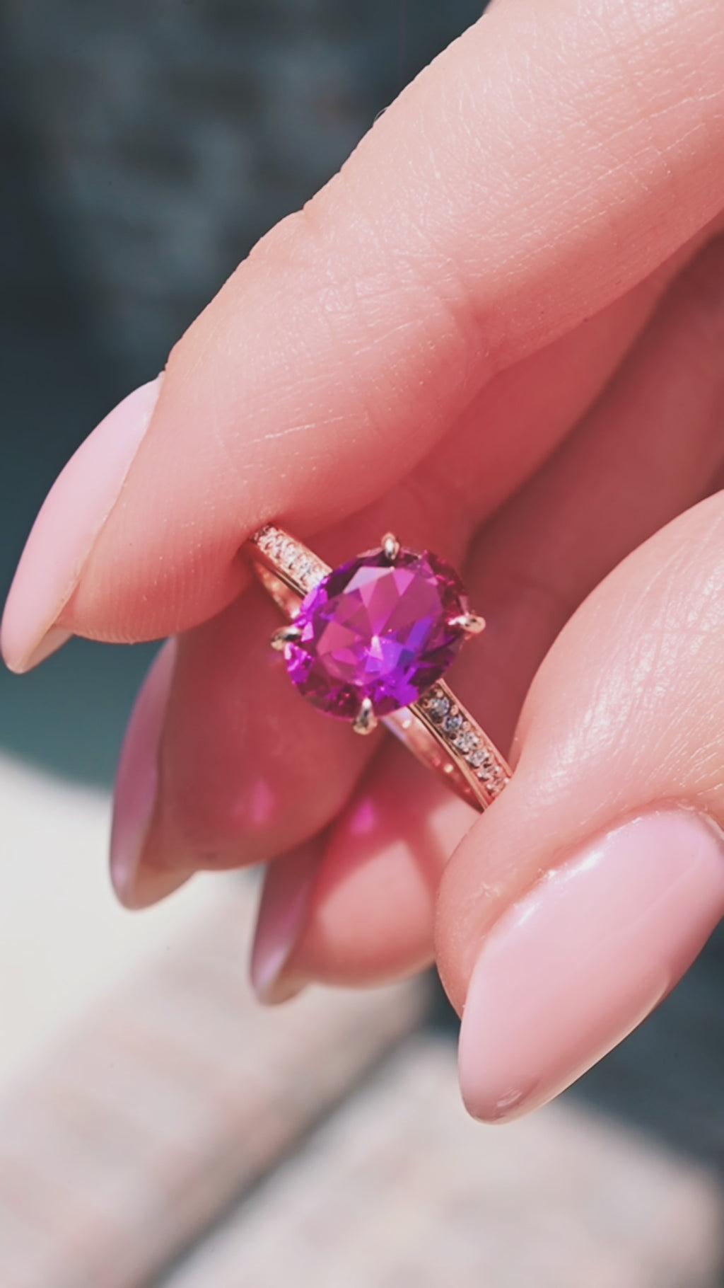 Video of an oval pink tourmaline ring by Aquamarise, shown in motion