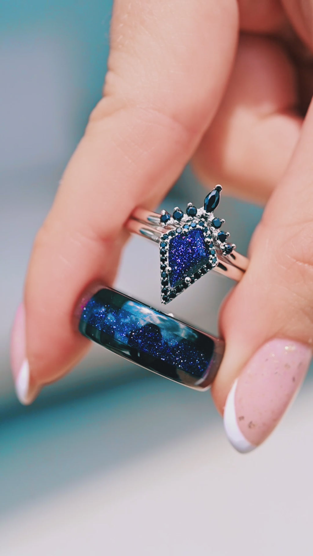 Video of the Starry Night and black onyx couples ring set by Aquamarise, shown in motion