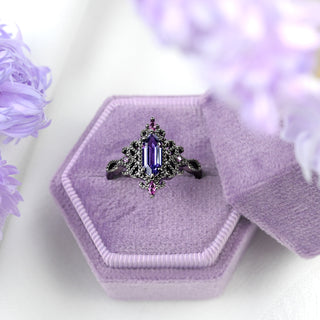 Ravenna Hexagon Lab-Grown Cornflower Sapphire Engagement Ring in Black Ruthenium in a lilac velvet ring box