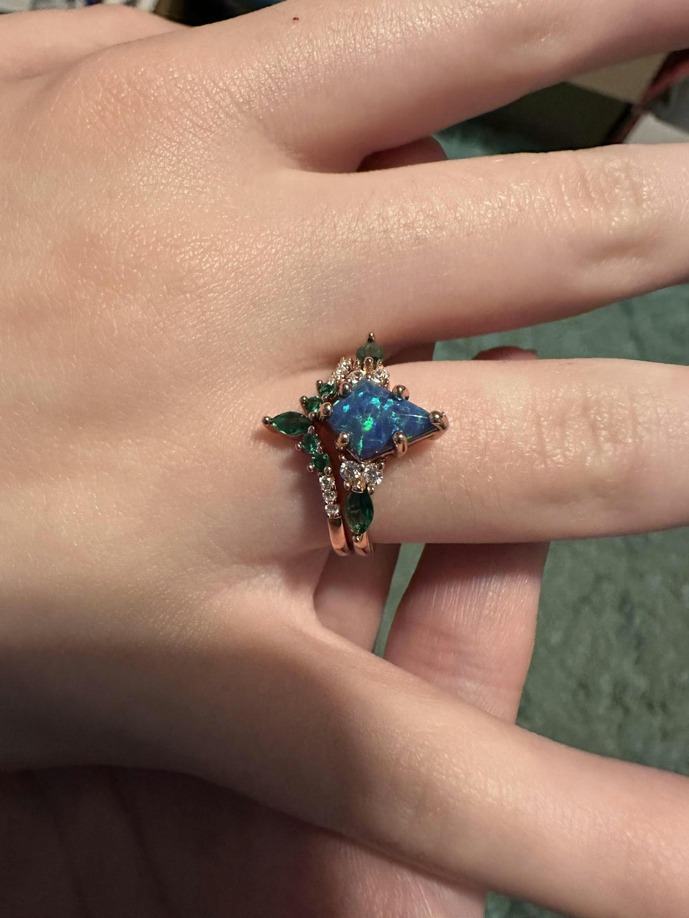 Skye Kite Peacock Fire Opal and Emerald Ring Set in 14K rose gold vermeil worn by a verified Aquamarise customer, photo from the review