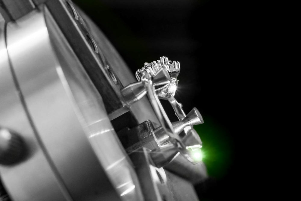 Laser engraving process on an Aquamarise ring
