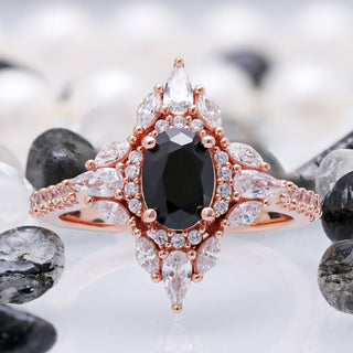 Stella black onyx ring in 14K rose gold vermeil, oval black onyx framed by a marquise and round white halo on a pave band