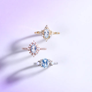 three aquamarine engagement rings march birthstone banner