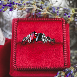 Toi Et Moi Garnet & Black Onyx Leaf Vine Engagement Ring in Black Ruthenium in a red velvet ring box