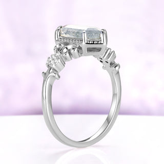 Profile of the Vesper hexagon labradorite ring showing the low bezel gallery and slim rhodium-finished sterling band