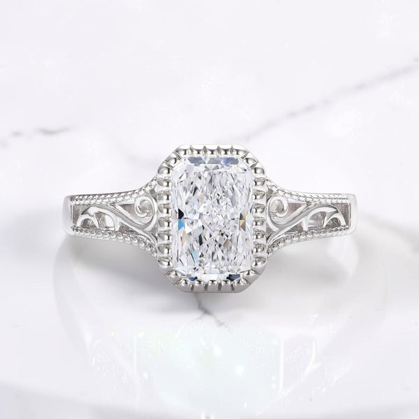 Vintage bezel-set engagement ring by Aquamarise shown in a ring style banner