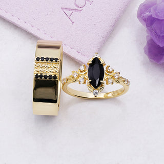 Viridian marquise black onyx ring and matching men's leaf band in gold vermeil displayed with the Aquamarise jewelry pouch