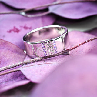 Viridian Leaf & Amethyst Men's Wedding Band in Sterling Silver (8mm) on purple flower petals
