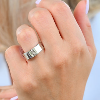 Viridian leaf and green tourmaline 8mm wedding band in sterling silver worn on a hand