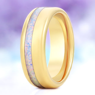 White fire opal men's wedding band in polished yellow gold tungsten, 8mm, standing view showing the off-set white opal inlay and domed profile