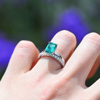 Emerald Cut Emerald Engagement Ring in Sterling Silver (Hidden Halo)