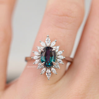 Aurora Alexandrite Ring - Sterling Silver by Aquamarise featuring an oval alexandrite center surrounded by marquise and round simulated diamonds in a vintage-inspired halo setting.