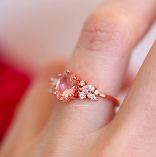 Lily Oval Morganite Flower Ring in 14K Rose Gold Vermeil by Aquamarise featuring an oval morganite center with floral-inspired accent stones on a delicate rose gold vermeil band
